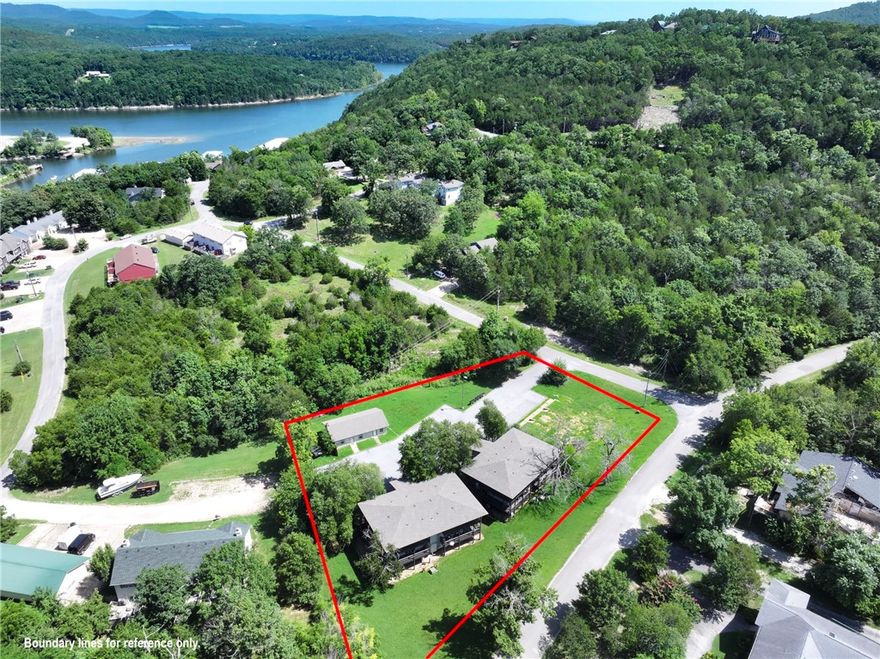 Turn key property with on site manager and cleaner in place. 13 Units with a vacant lot to expand. Current rents are nearly $9,900 per month. 2 separate 3 story buildings with (6) 1 bedroom units per building. Owner pays water bill. (approx. $350 per month.) Units rent on average for $725 per month. Separate single story 2 bedroom unit that rents for approx. $1200 per month with AirBNB. Laundry room attached to the 2 bedroom unit with 3 washers and 3 dryers. Potential for extra income with paid washer and dryers. new roof, paved parking lot and fresh paint on the exteriors in 2021. Close to Table Rock lake and Holiday Island Marina.