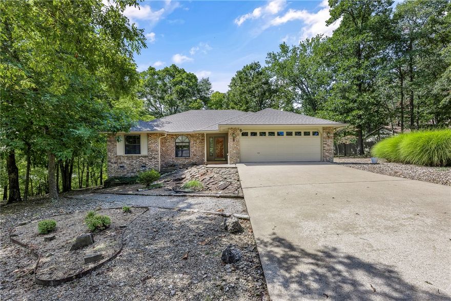 Immaculate custom built home on a quiet cul-de-sac in the Heart of Bella Vista! Sitting on a level half acre landscaped lot with mature trees. Offering open living space including formal dining as well as a light filled eat-in- kitchen. Beautiful cabinets and smartly laid out kitchen that opens to sunroom/porch. Large main bedroom has double vanities and double closets. Living room focal is a Gas log fireplace. Lower Level 16x26 ft heated and cooled workshop/storage/golf cart storage, adds so much value. Comfort, function and style combined makes this home move in ready. Added benefits : Near Trails, Lake Windsor access, Tanyard Creek golf range , BV Country Club ,Town Center shops. Bentonville Schools.  Covered deck overlooks large level back yard.  Roof 2019 ,HVAC just serviced,new dishwasher and disposal.  I know you will love this home.