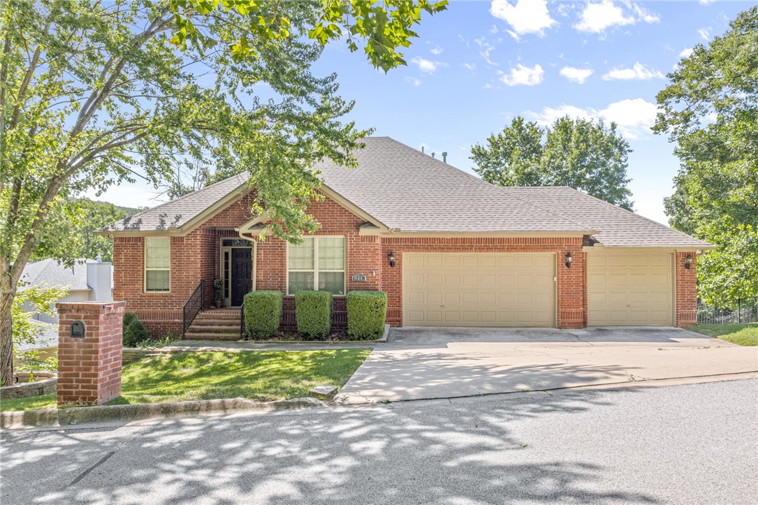 Spacious 4-bedroom rental with pool in Fayetteville! All appliances included! This home features two living areas along with a large backyard, two level deck, built in pool, hot tub, and more! 3 car garage provides great additional space. Foyer entry welcomes you into the living room. Living room has gas corner fireplace and French door access to upper deck. Formal dining room. Eat in kitchen has gas range, double oven, and granite counters. Primary bedroom boasts a large bath with whirlpool tub, walk in shower, and large WIC. Downstairs there is a second living space with access to the lower deck, pool, and hot tub. Large outdoor living space and fenced yard. Great location in well-established neighborhood with quick access to all Fayetteville as well as I49.
