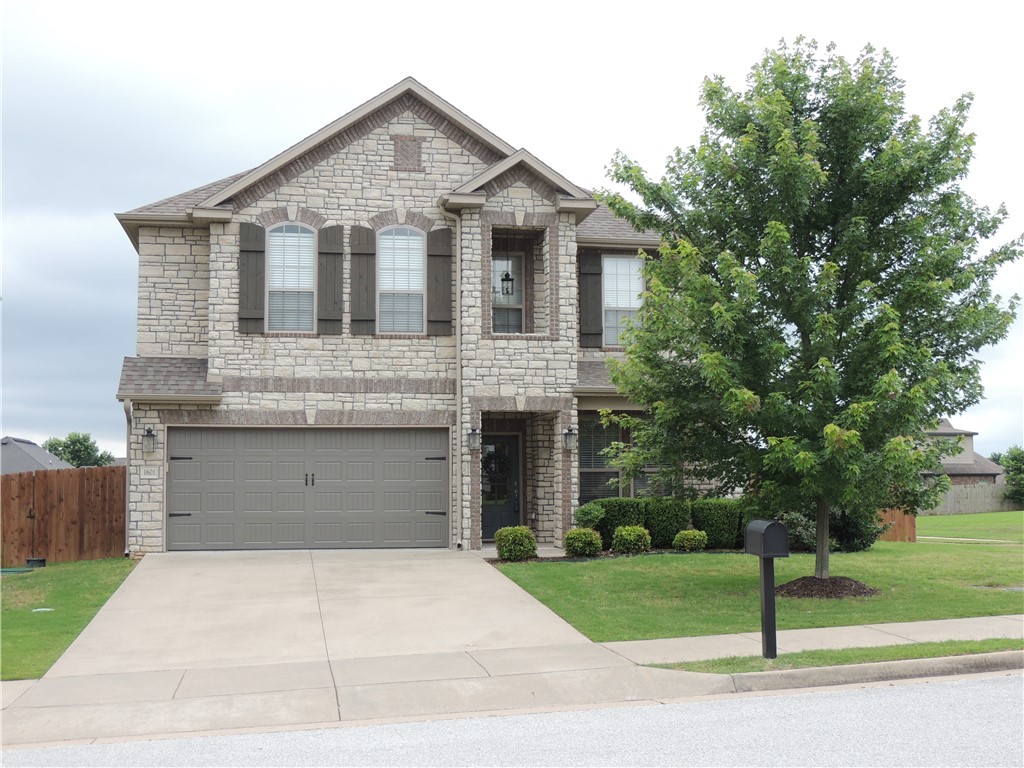 Welcome home to this well maintained home in the highly sought after Brentwood Subdivision. This beautiful home is located on a corner lot with a great location across from the community pool and playground. The downstairs is open concept with plenty of natural light. The kitchen features a gas stove, large island with 3cm granite and a farmhouse sink. The primary bedroom and an additional bedroom (currently used as an office), are on the main level, along with a powder room, living room, dining and laundry room. Upstairs features 2 bedrooms, full bath and a loft area. The backyard has plenty of space for practicing sports with your kids or entertaining your friends and family. Conveniently located down the road from Janie Darr Elementary and minutes to I-49, Rogers Promenade and Hwy 112 to Cave Springs or Bentonville.