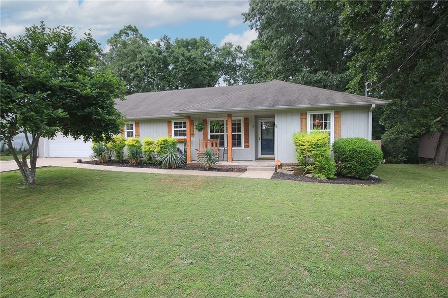 Prime location just a 2 minute ride to the Back 40 Bike Trail / 5 minute drive from new Bike Park / 71 business. This 1,517 sq ft, 3-bedroom, 2-bath, 2 car garage with workshop, open concept floorplan with a flex room (office) home sits on a private / spacious 0.31-acre lot. Features include a screened-in back porch, a oversized, flat, fully fenced backyard—ideal for year-round outdoor enjoyment. Built in 1997, the home offers numerous updates including a new HVAC system (2022), updated flooring (2025), new fence (2024), remodeled primary bath (2025), updated kitchen (2019), and replaced septic tank (2025). Additional improvements include a new electrical panel (2022), microwave (2022), and dishwasher (2026). Roof will be replaced prior to closing, offering added peace of mind.