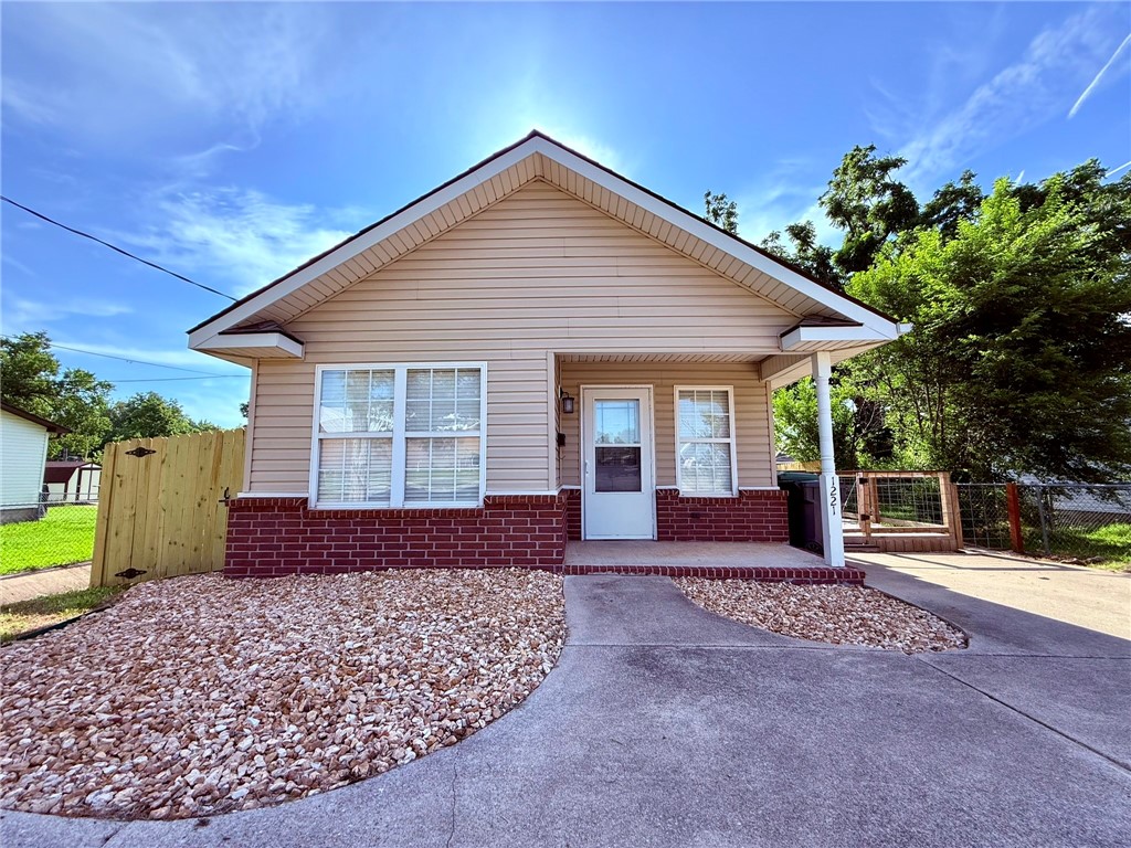 Cute home across from Heritage High School. Wood style flooring and crown molding throughout. Kitchen includes refrigerator, over range microwave and dishwasher. Great deck for entertaining and a fenced back yard. Large storage shed and Washer/dryer included.