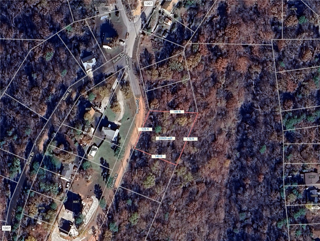 Beaver Lake area lot in the Beaver Shores Subdivision. Very Secluded with a few houses on the street. Prairie Creek Marina and 3 other boat launch ramps located just right around the corner. Minutes to Downtown Rogers. Water and electric at street.