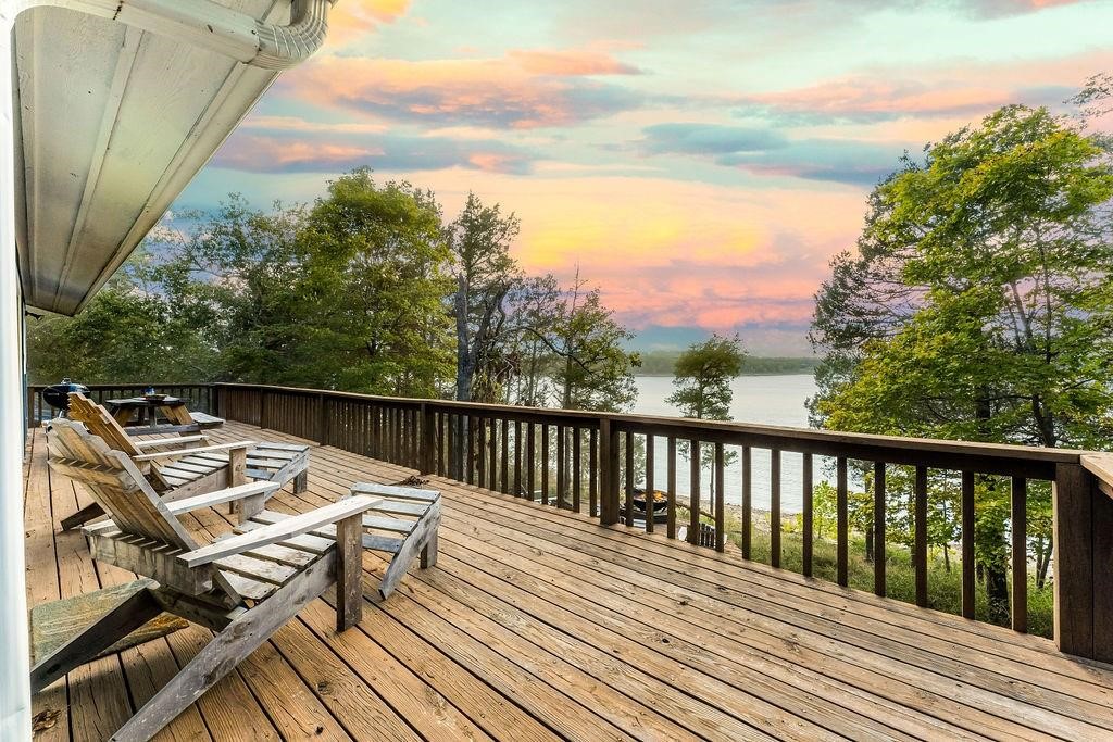 Amazing lakefront cabin!! The view and setting will blow you away! Low corp line and cleared lot make this
a very rare property! The cabin has been completely remodeled and is ready for your weekend getaway or
use as a nightly rental! The wood stove will make it a cozy retreat in the winter and this place is only an
about 5-10 minutes from Rocky Branch Marina for your summertime activities!