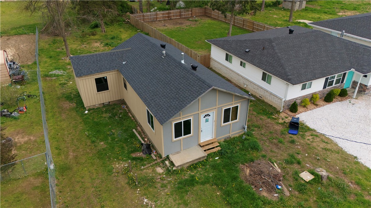 This property at 1021 S B Street has been gutted to the studs and is ready for your finishing touch. The heavy lifting is already done—new roof, updated plumbing, electrical, new windows, ductwork, and framing are all in place.
Designed with an open-concept kitchen/living area, the layout includes 2 bedrooms and 2 full bathrooms. Located just minutes from Downtown Rogers, Lake Atalanta, and many shops and restaurants.
Whether you're looking for your next fix and flip or a buy and hold investment, this property offers a huge upside with major renovations already completed.
Sold as-is. Bring your vision and turn this into a beautifully finished home in one of Northwest Arkansas’s fastest-growing areas!