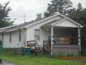 Looking for a rental? This is it! Vinyl-sided home sold AS IS and WHERE IS. Repossessed home with no warranties expressed or implied.