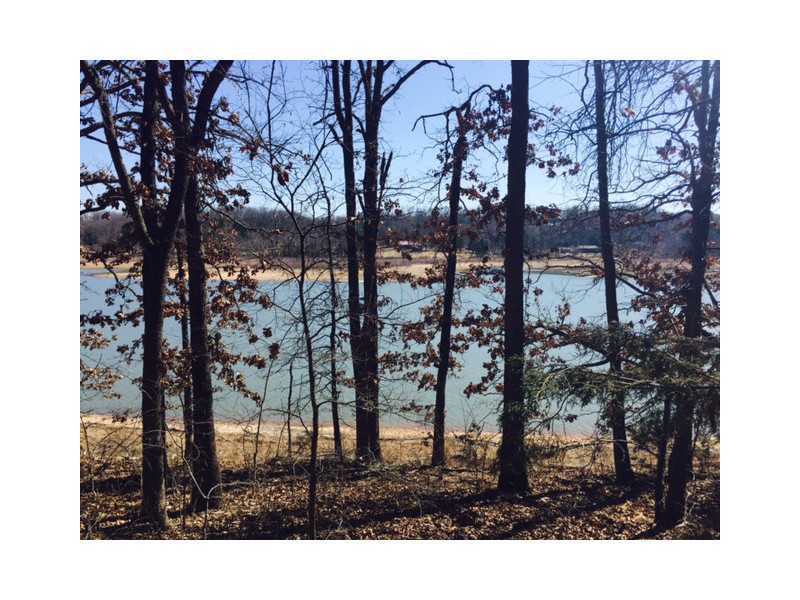 Beautiful View of Beaver Lake! Lake Frontage close to where the White River/War Eagle split. Close to Hickory Creek Marina. Paved Road to property, then easy access on well maintained drive all the way down to building sites & then an easy walk to lake!,Enjoy abundant wildlife while relaxing looking at the amazing serenity of the water. Large treed lot with lots of options for building a dream home or small weekend "get-a-way"! 2 Tracts 6.58 Acres & 3.41 Acres Also Listed Separately as ML#726906, #726907