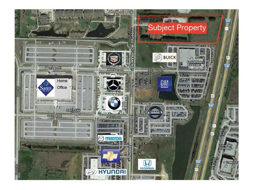 Great opportunity to purchase a commercial lot across from the new Sam's Club 400,000 sf home office and in the middle of Bentonville's Auto Row.  Both Moberly Ln & I540 frontage. 9,600sf building on site is leased.