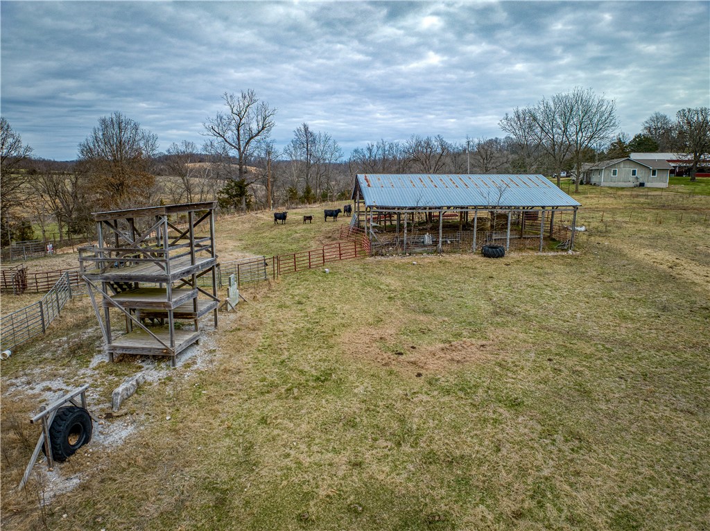 Amazing 135 acres property located between Harrison AR and Branson MO, just 1.5 miles off of Hwy 65 N. It's a great small farm with rural water, fenced and cross fenced with several building sites. Property also features several ponds and a pole barn. It is definitely work checking out.