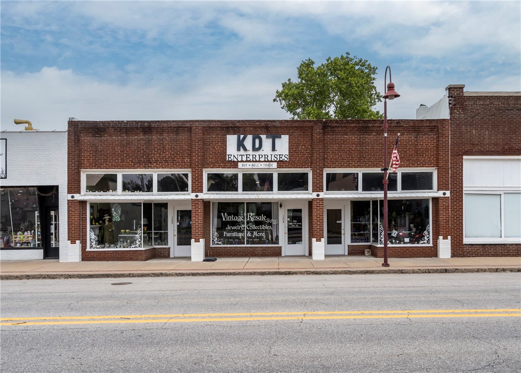 Take advantage of this rare opportunity to own a piece of commercial property in the heart of Gentry, a community thatās rapidly growing and thriving. This beautifully remodeled property features three individual storefronts and a total of 2,898 sq. ft. of versatile spaceāideal for retail, office, or mixed-use possibilities. Thoughtfully updated while preserving its historic character, it offers the perfect balance of move-in ready functionality and flexibility for future expansion or customization. Whether youāre an investor or a business owner, this prime downtown location is a standout opportunity in one of Northwest Arkansasās most charming communities.