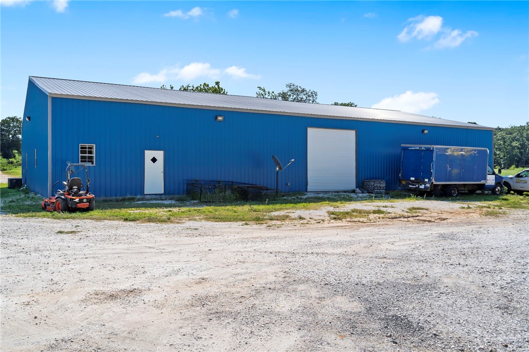 Recently constructed and situated on 4.50 level acres, this flexible, well-equipped space offers 6,000 sq. ft. of fully climate-controlled warehouse, office, & flex space with full foam insulation throughout. 3 oversized offices, 2.5 bathrooms, oversized conference room, kitchenette, and a large reception area with tall ceilings perfect for display & client engagement. The warehouse features two 14x18 overhead doors for flexible logistics & ample space for operations. Parking for employees and visitors. Flexible commercial space that combines office and industrial warehouse capacity with highway frontage. This property is ideal for a new business venture or as a tenant occupied commercial space. Also listed ML #: 1315659