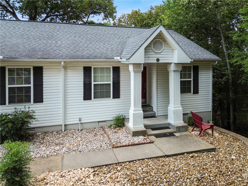 Enjoy lake living in this charming 3-bedroom condo, complete with an additional living space downstairs—perfect for guests, a home office, or a cozy retreat. Located in a well-kept 4-unit building, this home offers designated parking and beautiful lake views right from your windows. You’ll be just steps from the water, within walking distance to the lake, and close to the marina for easy boating access. Whether you’re looking for a weekend getaway or a year-round residence, this condo blends comfort, convenience, and a touch of lakefront serenity.