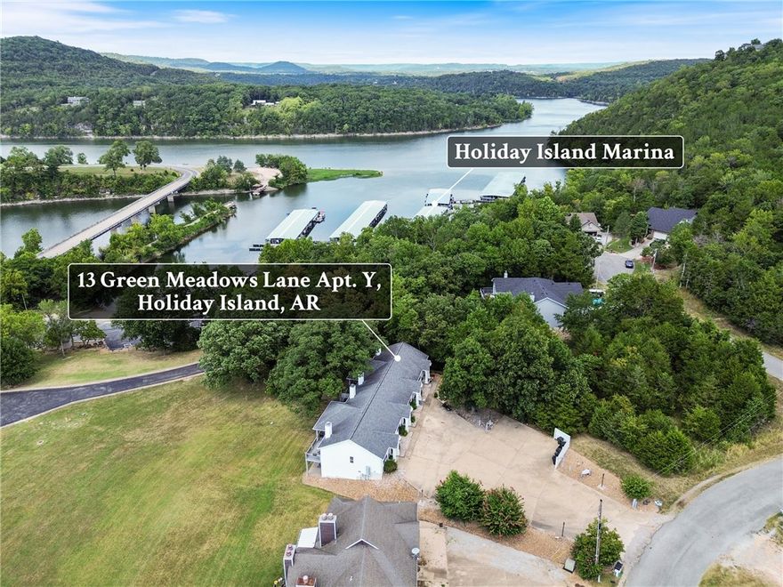Enjoy lake living in this charming 3-bedroom condo, complete with an additional living space downstairs—perfect for guests, a home office, or a cozy retreat. Located in a well-kept 4-unit building, this home offers designated parking and beautiful lake views right from your windows. You’ll be just steps from the water, within walking distance to the lake, and close to the marina for easy boating access. Whether you’re looking for a weekend getaway or a year-round residence, this condo blends comfort, convenience, and a touch of lakefront serenity.