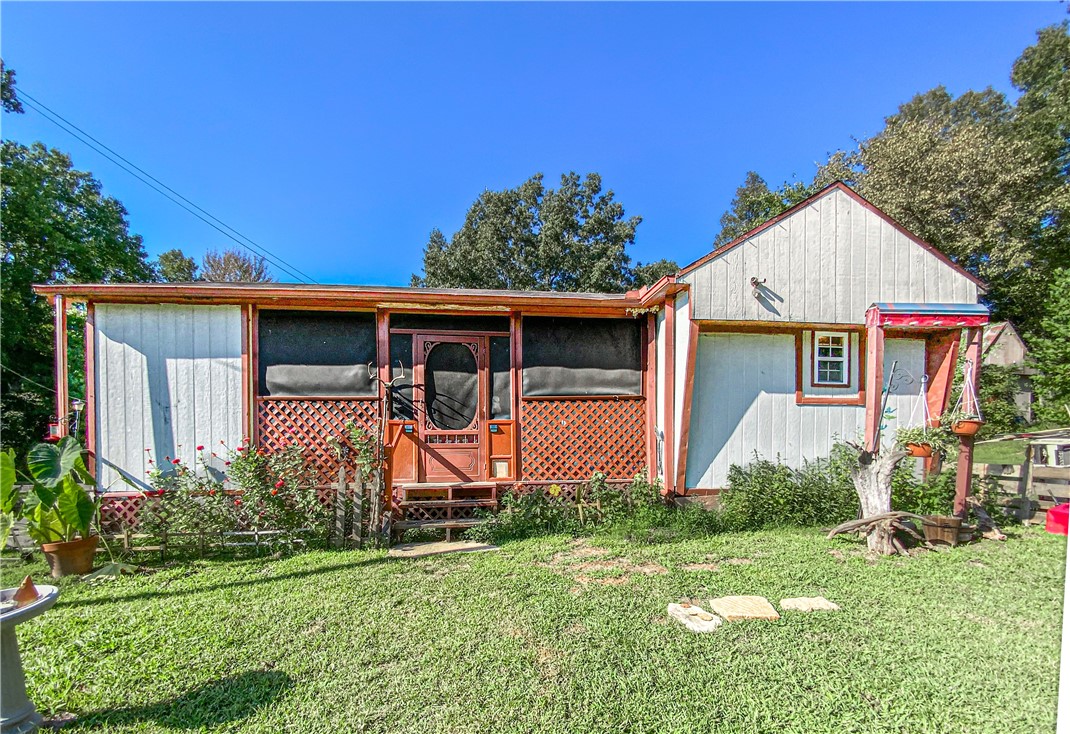 Investment opportunity! 20 acres m/l of woods and pasture with two mobile homes currently rented in a park like setting. One well is shared between the two homes. Property is located a short distance from Harrison which gives you easy access to shopping, restaurants and entertainment without living in the city limits.