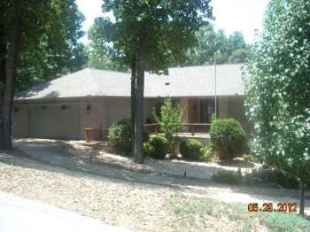 Great opportunity for someone looking for a project. This is a lake house with a dock on Loch Lomand. This a substantial price reduction. Brand new roof and gutters due to latest storm damage. Seller out of state. Square footage includes finished basement. There is also a workshop under the stairs. Excuse the clutter. This is a work in progress. 2-bedroom septic. It's now vacant. I will do new pictures soon. See supplement.