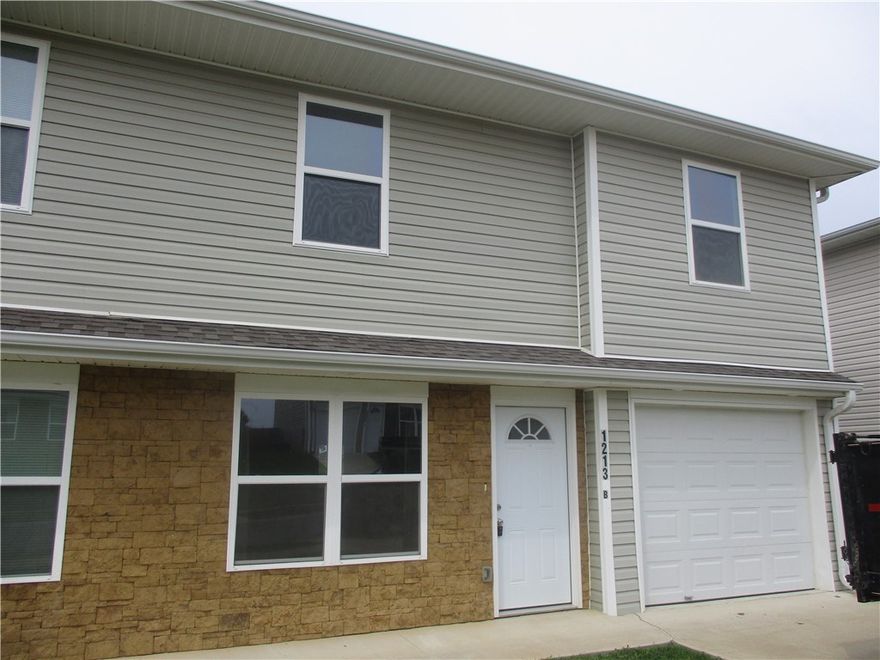 Built in 2023, this well-kept townhome features a modern split-level design with an open living, dining, and kitchen area on the main level. The kitchen is equipped with granite countertops, LVP flooring, and stainless steel appliances. Upstairs offers three bedrooms including a primary suite with a spacious walk-in closet, plus a guest bath with a walk-in shower and convenient laundry area. The home has been freshly cleaned and is move-in ready, with only minor touch-ups needed to make it your own. A great option for anyone seeking a comfortable, low-maintenance home with modern finishes.