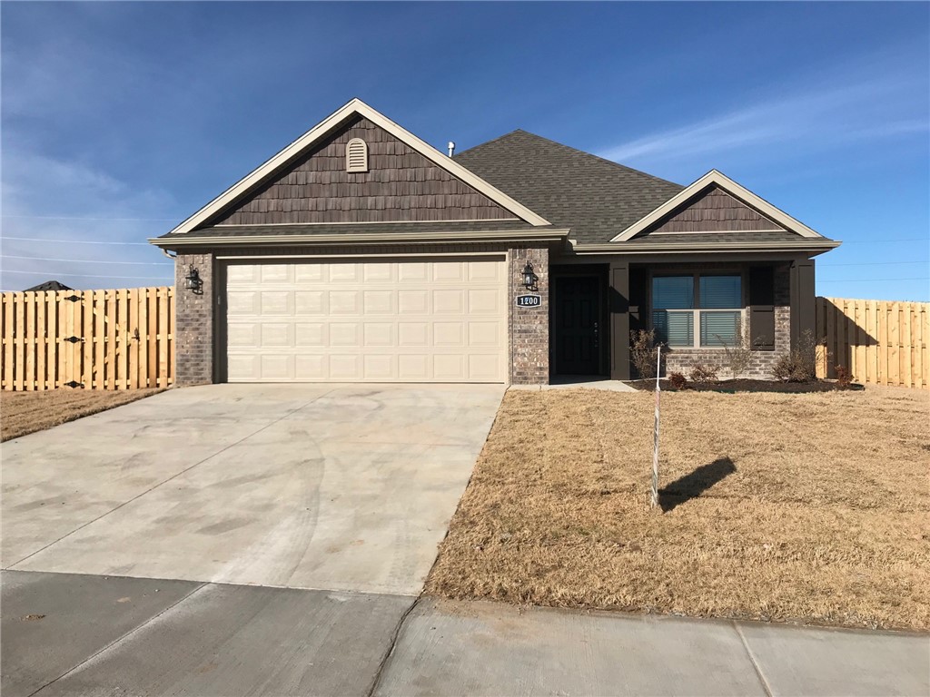 Beautiful New Construction 3 bdr/2bath all brick home built by Riverwood Homes located in within walking distance to Bentonville West High School! Home features gas log fireplace, high ceilings in living room and dining area creating a spacious environment, 2-car garage, and a covered patio in back. Kitchen features stainless steel appliances, granite counters, and subway tiled backsplash.