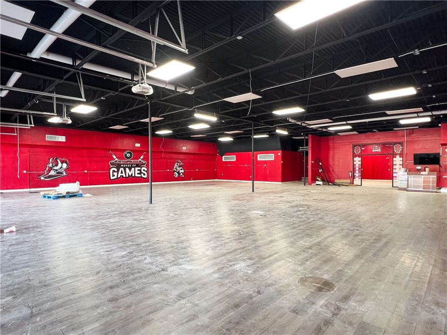 Imagine your business seamlessly blending with the energetic pulse of College Avenue, as these expansive glass doors invite natural light to cascade into your space, creating an atmosphere of openness and vitality. The sleek and modern design not only enhances the curb appeal but also offers a unique way to showcase your products or services. This property isn't just a building; it's an opportunity to make a statement, to captivate passersby, and to become an integral part of the vibrant College Avenue community.