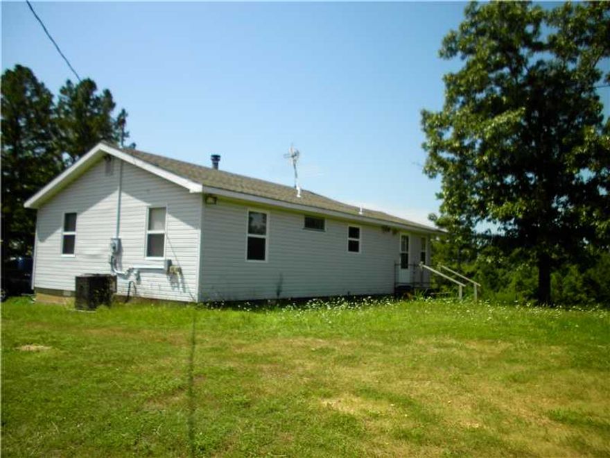 RURAL CHARMER SITS ON TOP OF RIDGE. ROOM FOR HORSES OR JUST ENJOY THE SOLITUDE. IF YOU WANT TO GET AWAY, THIS IS IT! PINE TONGUE & GROOVE CEILINGS. 15X12 HORSE BARN WITH LOFT, ELEC & WATER, ALL APPLIANCES STAY.