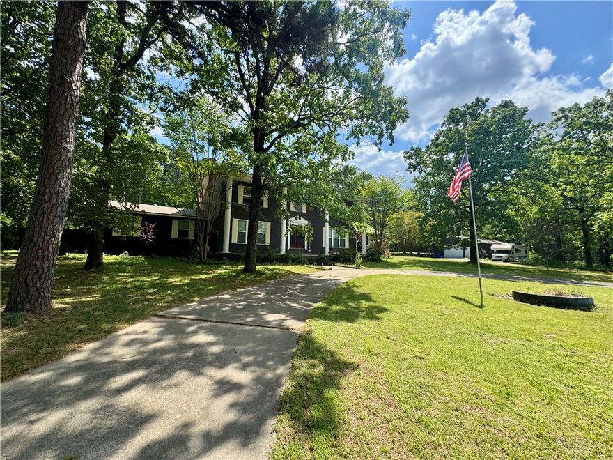 Welcome to your private retreat at the end of the Dawn Heights subdivision. This sprawling estate sits on 1.52 acres across two lots, offering rare space and privacy within city limits. With 3,616 square feet of living space, this home is designed for both scale and comfort. The interior shines with Brazilian Pecan hardwood flooring and a kitchen featuring granite countertops. The thoughtful layout includes a downstairs office or flex space and a primary suite with an ensuite bath. Upstairs, you will find four additional bedrooms, including a second primary suite with its own private bath, totaling 5 bedrooms, 3 full baths, and 2 half baths.

The outdoor amenities are a true showstopper. Enjoy a completely updated pool, an expansive entertaining patio, a covered porch, and a raised deck perfect for summer gatherings. For those needing extra workspace or storage, the massive 28x60 shop provides endless possibilities. This property offers a unique lifestyle that must be seen in person.