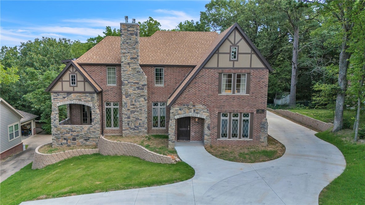 Just steps from the Razorback Greenway, nestled in the heart of Fayetteville, sits your dream forever home. 4 bed, 3.5 bath, 2,762sqft. Enjoy the large kitchen, well appointed primary quarters, office, formal dining, coffee bar and much more. The finishings are next level, including white oak flooring, custom doors/glass, specially ordered sinks, cabinets, handles & pulls. The 10-speaker sounds system turns your living room into a theatre type setting while you look over the huge back deck and yard that sits on the .43 lot. The massive back deck is wired 220v to power a hot tub. The backyard is portioned off for the family dog (w/dog door built in). Notes: The lot was purchased in 2023 (ML#1235725) for $205k. Engineering and construction finished early 2025. This truly is a beautifully rare property at an amazing location. Book your private showing today! Also listing for sale at ML#1314956