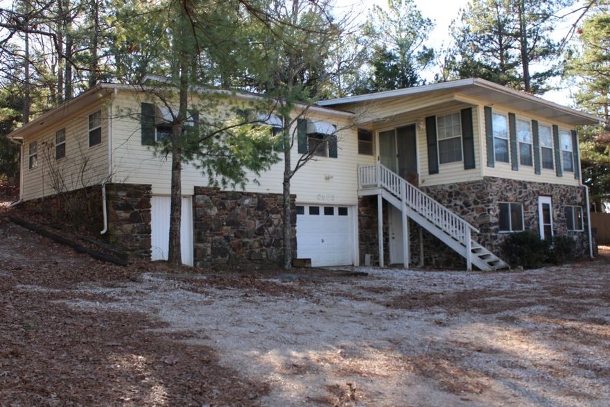 Home - Shop - Hwy 392 Frontage!! 3 bedroom 3 bath home, unfinished basement, 578 sq ft shop building with concrete floor, electric & overhead door 9x10, nearly completed new 18x20 ft metal building with concrete floor, 2-8x12 sheds and 1-12x12 shed, nice front yard with trees, home has nice living area with wood stove, near new kitchen range and dishwasher, 3 bedrooms 2 of which have private baths. Roof was new in Aug 2019, minor maintenance & touch-ups needed, central heat/air units have not been used for past few years. Property includes 0.78 acres with Hwy 392 frontage within 4 miles of Harrison, come see today!!