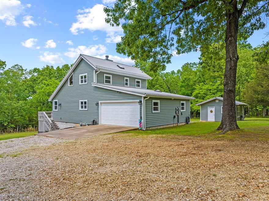 Your dream lake house is ready—but it won’t last long! Don’t miss out on this incredible property. Whether you’re seeking a family getaway or a nightly rental investment, this home has it all. The main house features a master suite on the main floor, ADA compliant with a remodeled bathroom including a step-in shower. Upstairs, two more bedrooms await.

There’s also a fully equipped guest house that sleeps four comfortably. The property is a short walk to the lake and borders the Corp, putting you as close to the water as possible. Spanning 3.5 acres m/l, there’s plenty of room to enjoy.

Along with the house and guest house, there’s a spacious 22x40 detached two-car garage with a workshop area. Enjoy stunning winter lake views, and know this well-maintained, move-in-ready home is waiting for you. Whether it’s your full-time residence, a family retreat, or an investment property, you’ll love this home.