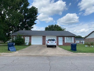 Duplex located near Housing Authority and in walking distance of downtown. Each unit has two bedroom, 1 bath and 1 garage.