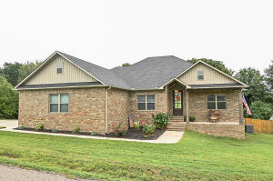 This is the ONE! Absolutely stunning newly built home located in the Pottsville school district. The welcoming front porch leads you inside this curated 4 bedroom, 3 full bath home. 2331 square feet of stylish living space with luxury vinyl flooring throughout. You will find a shiplap layered wood burning fireplace and vaulted ceilings in living room. The living and kitchen are open concept with an efficient flow plenty of space to entertain or just have family time. Modern farmhouse kitchen with granite countertops, stainless appliances, coffee bar and large walk in pantry! Master bath features a luxurious soaker tub, walk-in shower and huge closet that is connected to the mud/laundry rm. Huge fenced in backyard with play set and newly built covered back deck. This is a must buy now!