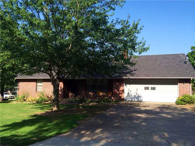 This is a fantastic 3 BR, 3 BA brick home! Large rooms, lots of closets & storage, built-ins, large kitchen with lots of cabinets, gas log fireplace in living room. Nice covered front porch plus a deck at the back of the house. Great yard and storage,building.