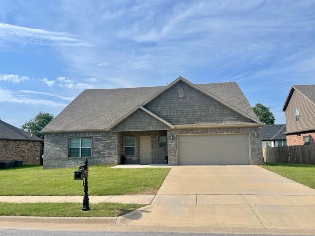 Four bed 2.5 bath home located just minutes from I-49. This property features many amenities including all stainless steel appliances except washer, dryer and fridge, granite counters, wood like tile throughout, gas log fireplace, 2" faux wood blinds and much more.