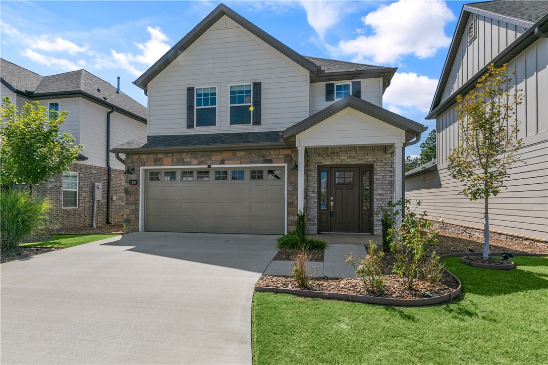 This well-designed 4-bedroom, 2.5-bath home with a 2-car garage is minutes from Walmart HQ, parks, trails, schools, and hospitals. Cozy living area with a fireplace and an open layout. Kitchen which features an island with bar seating, and ample cabinet space. The dining area is bright and inviting. Upstairs, all bedrooms offer privacy, including a spacious primary suite with a walk-in closet and a large walk-in shower, jacuzzi tub, and upgraded tile. Background and credit check required