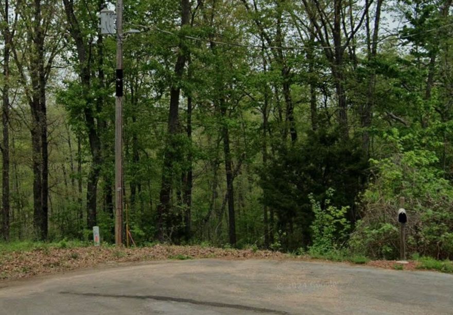 Great lot on Lonsdale drive, backing up to the Bamboozled Trail. Perc test suitable for 3 bedroom.