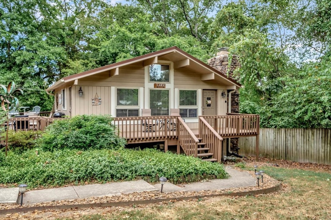 Fantastic Beaver Shores home boasting a 0.39 acre corner lot. Oversized detached garage. Expansive wrap around decking with tons of room for enjoying the outdoors. Home has been updated with granite counter tops, new flooring and appliances. Hot tub conveys. Home has been operating at AirBnb and can be purchased completely furnished. Square footage includes approximately 729 square feet on each level per the county website.