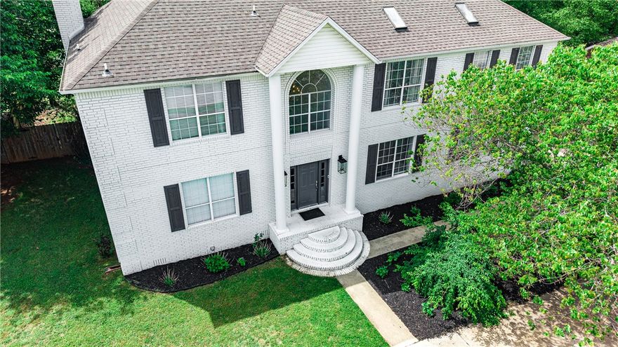 Welcome to 1799 N Buckley Dr — a stunning 6-bedroom, 3.5-bath Georgian home in the sought-after Barrington Parke community of east Fayetteville. Walkable to St. Joseph's Catholic School and zoned for Vandergriff Elementary and McNair Middle, this 4,001 sq ft gem sits on nearly half an acre with an impressive list of updates: new roof, deck, hardie board siding, fresh paint inside and out, a remodeled master bath, a new Jack and Jill bath upstairs, and updated kitchen and powder room. Two gas fireplaces add warmth and character — one in the main-floor master suite and one upstairs. Four of the five upstairs bedrooms are genuinely oversized - all with walk-in closets. Step outside to a large deck and an expansive backyard perfect for entertaining, plus enjoy community amenities including a pool, playground, and volleyball. This one truly checks every box!