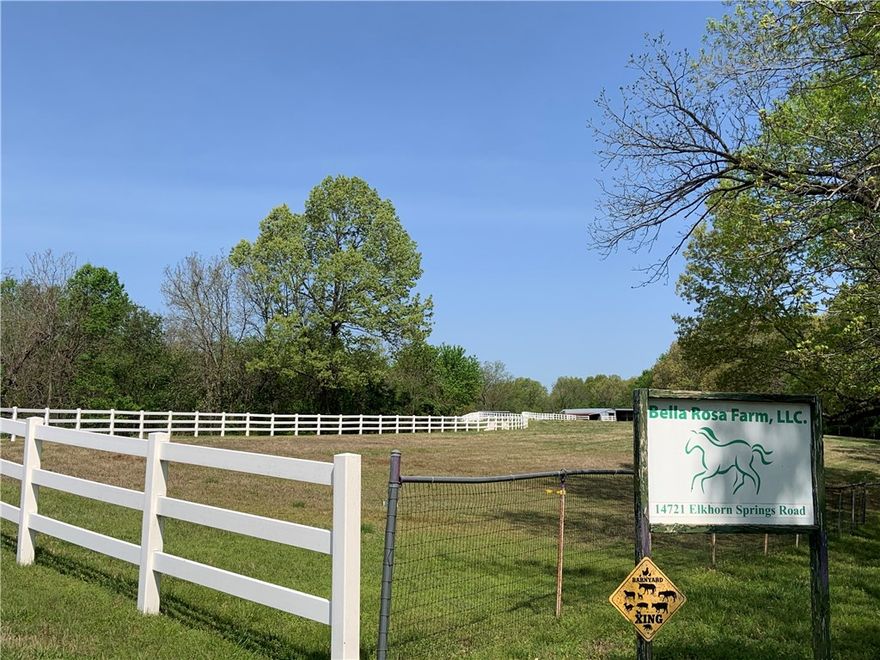 Super Horse farm on the outskirts of Fayetteville on 60 Acres! Horse barn with 10 stalls, tack room with bathroom, and horse wash area. Hay barn with storage room and workshop. Riding / roping outdoor arena (250 x 150), 10 paddocks with run ins, round lighted pen(60ft). Approximately 20 acres of open pasture for hay or livestock. 3 bedrooms, 1 bath manufactured home with a new roof in 2021. Numerous sites to build a new home.  Hook up for RV and 2 septic systems. Property sold as is.