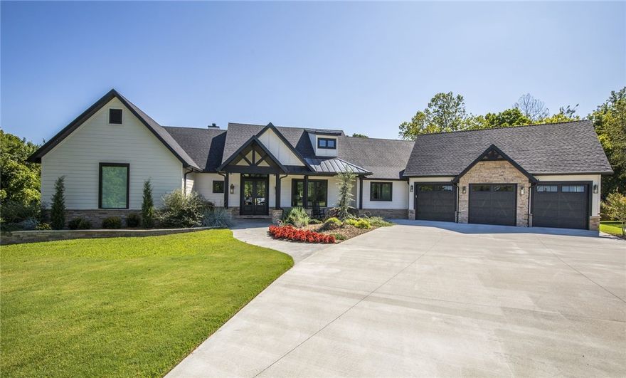 Sold prior to print. House is 2773sqft on main floor and 2422sqft in walk out basement with 10' ceilings. 50x75 heated and cooled shop building with 15x30 inside office with full bathroom