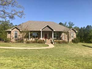 You're going to love this beautiful brick home with over 2700 ft. and almost 5 acres. The open, spacious floor plan is perfect for entertaining! Custom touches make this home cozy and untique! 4 bedrooms, 3 full baths, eat in kitchen, and large dining room! Home has covered front and back porch, making enjoying the outdoors perfect. Don't forget the BONUS room and updates through out! Easy to show!!