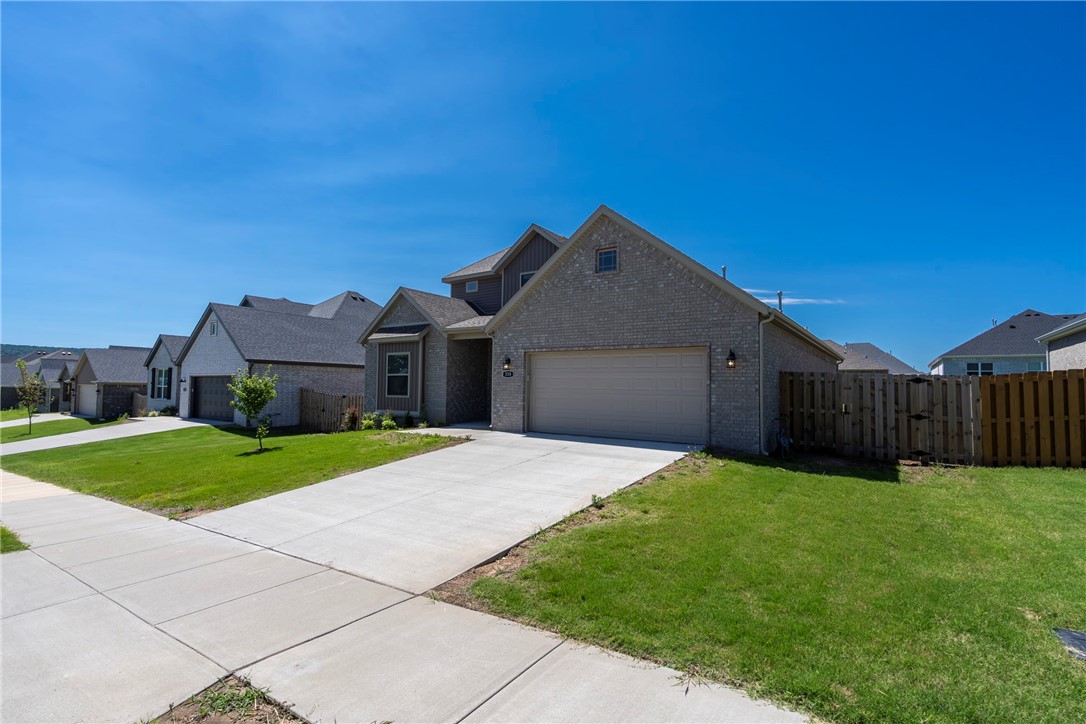 Beautiful 4 bed, 3 bath home in the rapidly growing Farmington area! Home has open concept, split bedroom design, and features a gas log fireplace, crown molding, and many upgrades. Ceramic tile in all wet areas, wood flooring in living, and plush carpet in the bedrooms. Kitchen has an island, granite counters, high end stainless appliances, pantry, and abundant cabinetry! Primary suite has dual vanities, jetted soaking tub, full tile walk-in shower with glass door, and spacious walk-in closet! Enjoy the spaciously fenced yard from the covered patio! This one has it all! Don't miss out!