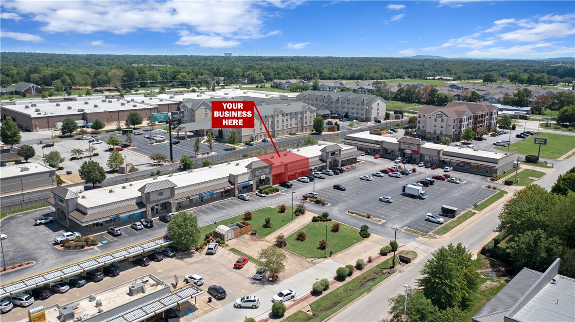 +/- 4,700 SF of retail space available for lease off W Walton in Rogers, offering a prime location with excellent visibility and accessibility. Currently used as a grocery store, this suite features a large showroom floor, two private restrooms, a smaller showroom floor or office, and two storage rooms (one of which would make a great manager's office). Ideal suite for grocery store or other retail business. Situated in the Kingston Centre, the property provides ample parking, prominent signage opportunities, and exposure to 31,000 VPD. Conveniently located just 0.2 miles from I-49, the major interstate system running through Northwest Arkansas, this space benefits from high traffic volume, ensuring maximum visibility and easy access for guests and employees.