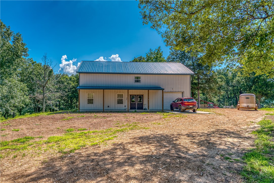 Discover the perfect blend of functionality and natural beauty with this 2 year old 2,693 sq ft home in the peaceful Wayton community of Newton County, Arkansas. Set on 9.5 acres with a mix of pasture and mature oak trees, this 3-bedroom, 2.5-bath home also includes a storage room that could easily convert to a 4th bedroom. Approx. 4 acres are fenced with a pole barn currently used as a mule pen. This property would be great as a permanent residence as well as a vacation home. The property also offers excellent deer and turkey hunting. Situated close to the Ozark National Forest makes this property ideal for outdoor enthusiasts. Enjoy privacy, space, and recreation in a stunning natural setting.