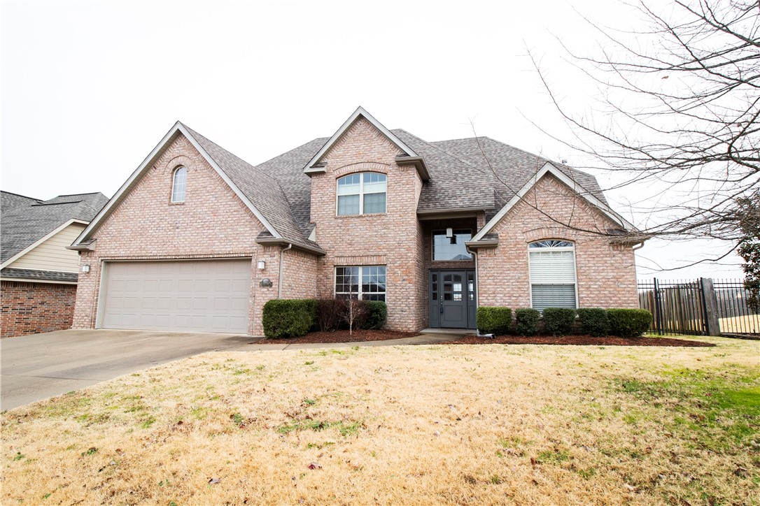 Wonderful home in the sought after White Oak Trails neighborhood. Just a short ride to Coler Mountain Preserve Trails or downtown Bentonville. Home backs up to an empty field owned by the schools. Main level features open floorplan with kitchen, living room, formal dining room and an extra room that can be an additional 5th bedroom, office or game room. Master is located on the main level with an oversized walk in closet. 3 bedrooms upstairs along with an open loft area and plenty of storage space. Home has a 3 car tandem garage allowing for extra space for any hobby. Large back deck, partially covered with gas hook up. New roof in 2018. Neighborhood has a community pool and a playground.