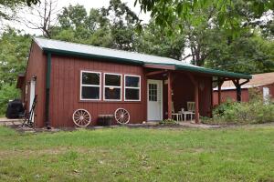 Country home on 5 acres, 4 bedrooms, 2 full baths, open floor plan, and spacious kitchen. All listed appliances will convey. nice patio to enjoy wildlife and a 72'x30' High Tunnel greenhouse. Land is roughly half pasture and half timber. If you are looking for a quiet place to make your own, then this is it.