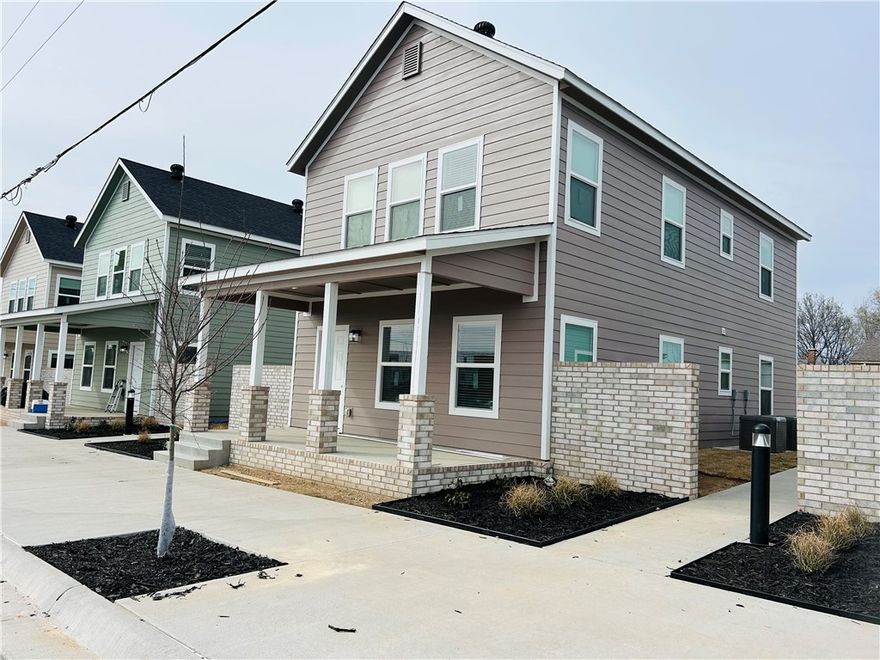 Brand new duplexes available for lease in downtown Springdale.  This townhome is a stacked duplex with TWO SEPARATE UNITS!  The 1st and 2nd floor units have almost the same layouts and finishes.  
This brand new two bedroom, 1 bath home features:  A modern kitchen with granite countertops, stainless steel appliances, pantry, washer and dryer, spacious closets, and so much more.  Steps away from the Jones Center, Luther George Park and the vibrant downtown area.  Walk or bike to local shops, restaurants, concerts, and the ongoing revitalization that's bringing new energy to the area.  
$1,350 per month with a $1000 deposit.  High speed internet is included.  12 month lease required.  
Pet friendly with an additional $250 non-refundable deposit and $50 extra monthly fee per pet.