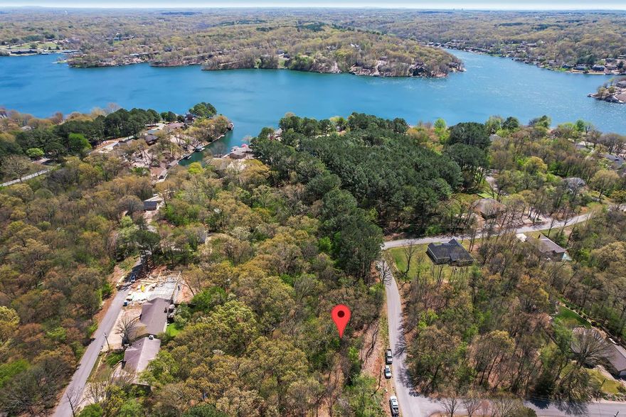 Welcome to your own piece of paradise near Loch Lomond in Bella Vista! With nearby golf courses and bike trails, this lot has something for everyone. Whether you're a casual rider or an intense mountain biker, you'll love the outdoor amenities that Bella Vista has to offer. Don't miss out on the opportunity to build your dream home in this stunning location.