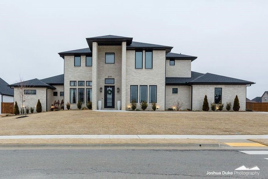 Incredibly well designed home in the sought after gated community of Scissortail in Bentonville built in 2020, the 5129 sqft / 4 bd 4.5 b/3 living area & 4 car garage will impress and delight. Jaw dropping spacious & light filled rooms that elude a modern elegance! The owner's suite is a real sanctuary w/ Morning bar perfectly positioned between 2 spacious separate water closets / 2 walk in closets / 3 vanities, a soaking tub & joined by a roomy tiled pass though shower w/ dual seamless glass doors!