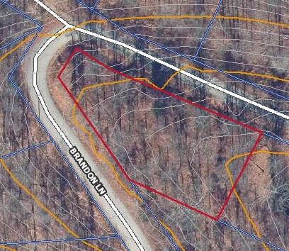 Welcome to this beautiful corner lot located in the sought-after Bella Vista community! Nestled in the Ozark Mountains, this location offers an ideal setting to build your dream home. The lot provides both privacy and the natural beauty that Bella Vista is known for. The lot is situated along two streets, offering multiple options for your future home. This wooded, corner lot offers natural beauty and privacy while maintaining easy access. At 0.35 acres, there's plenty of space to design your peaceful retreat. Whether you're looking to build a cozy cottage or a larger family home, this lot provides flexibility and room to grow. Enjoy the stunning surrounding of Bella Vista, including nearby Back 40 and Flo Ride trails. This property has a soil percolation test available with approval of a 3 bedroom property. Don't miss out on this opportunity to own a slice of Bella Vista! Contact us today for more information.