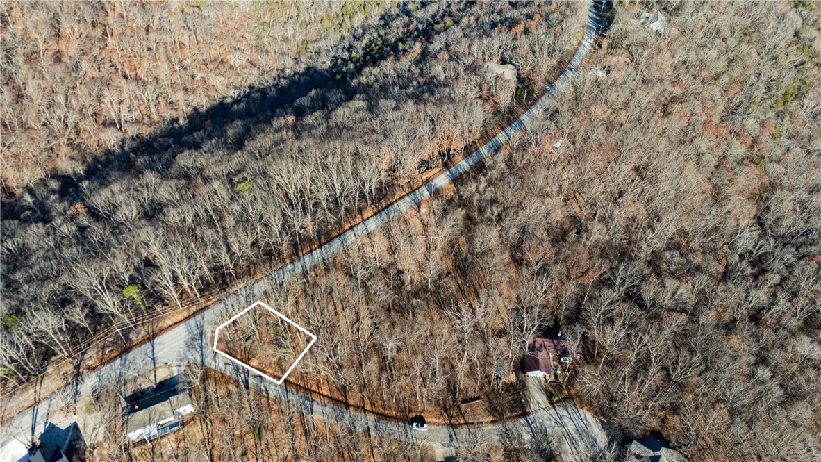 Experience resort-style living with this beautiful residential lot near the renowned Holiday Island 18-hole golf course. Located in the heart of the Ozark Mountains, Holiday Island offers a perfect blend of natural beauty and modern conveniences. Just an hour or less from Fayetteville, Rogers, Bentonville, and Branson, MO, youāll enjoy easy access to all that Northwest Arkansas has to offer. This vibrant community is surrounded by the stunning Table Rock Lake and features amenities like swimming pools, tennis courts, hiking trails, campgrounds, and, of course, world-class golf. Whether youāre seeking tranquility, outdoor adventure, or a close-knit community, Holiday Island has it all.