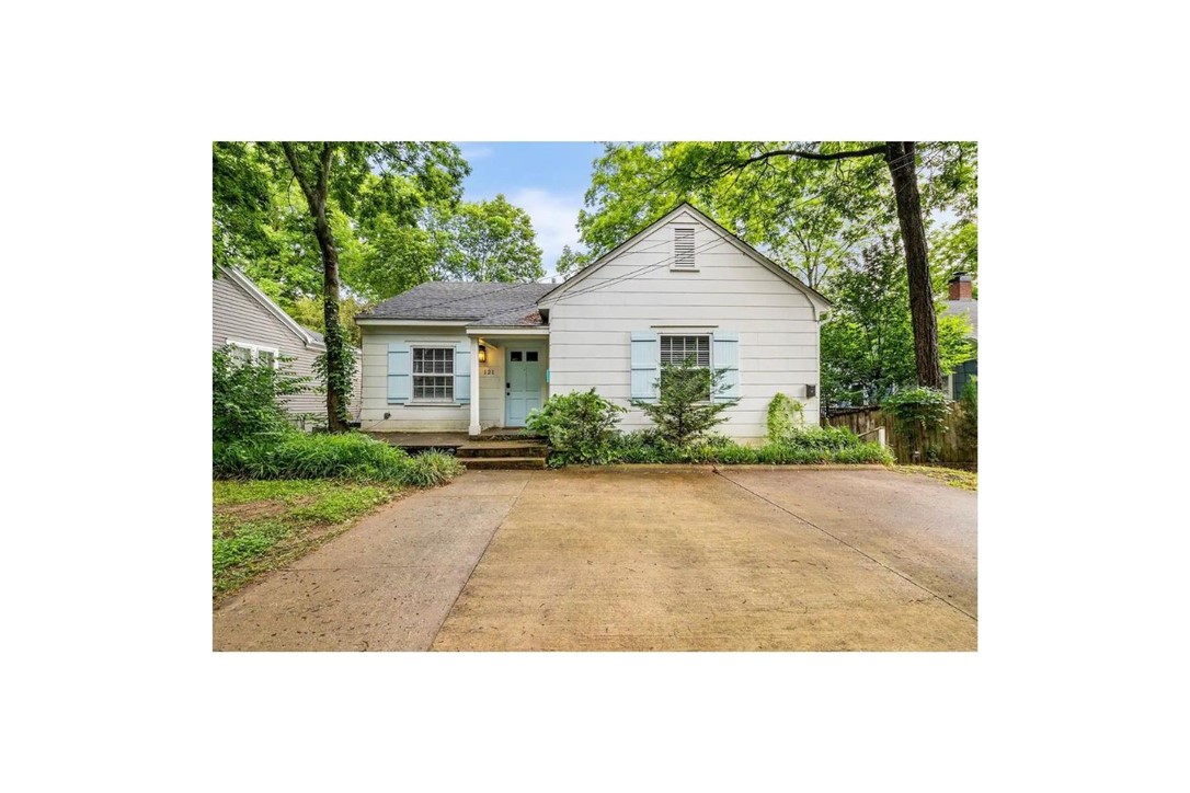 Dickson street Chateau. LOCATION IS EVERYTHING! Walking distance from Dickson street and the Square. You'll never need to Uber downtown again. Off-street parking, Updated home has refinished hardwood floors throughout, granite counters, lots of windows, skylight in kitchen, tons of natural light! 2 bedroom/1 bath includes a beautiful glass shower. Currently staged, price reflects unit without furniture. Furnishings could be negotiated. Available NOW!