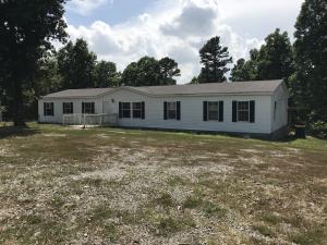 Four bedroom two bath mobile on 7.76 ac m/l. Mobile needs some work but has tons of potential.